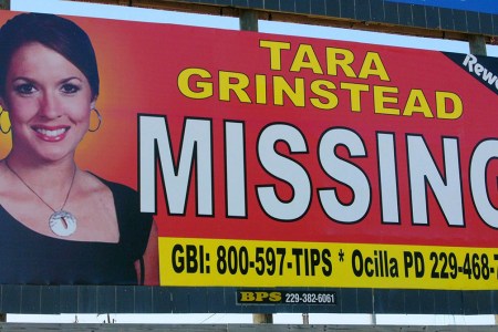 FILE - In this Wednesday, Oct. 4, 2006, file photo, missing teacher Tara Grinstead is displayed on a billboard in Ocilla, Ga. News organizations are challenging a judge's gag order in a case involving the slaying of Grinstead. (AP Photo/Elliott Minor, File)