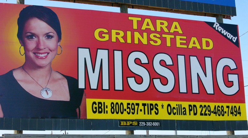 FILE - In this Wednesday, Oct. 4, 2006, file photo, missing teacher Tara Grinstead is displayed on a billboard in Ocilla, Ga. News organizations are challenging a judge's gag order in a case involving the slaying of Grinstead. (AP Photo/Elliott Minor, File)