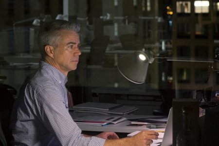 Businessman working late in office (Getty Images)