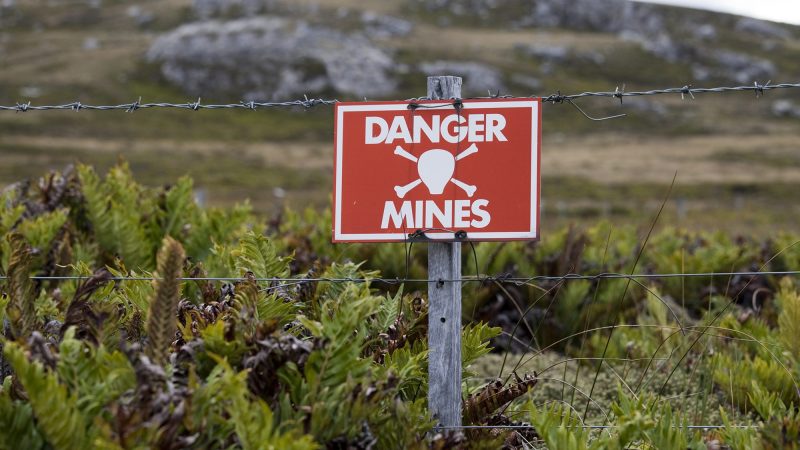 A warning sign marking one of the areas on the Falkland Islands still not cleared of mines planted by the Argentinian forces during the invasion of 1982. (Getty Images)