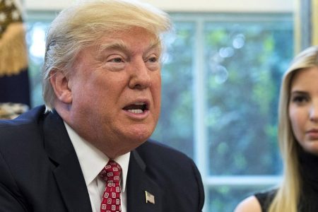 U.S. President Donald Trump speaks along with his daughter Ivanka Trump (R) and NASA Astronaut Kate Rubins (not seen), during a video conference with NASA astronauts aboard the International Space Station in the Oval Office at the White House April 24, 2017 in Washington, DC. (Photo by Molly Riley-Pool/Getty Images)