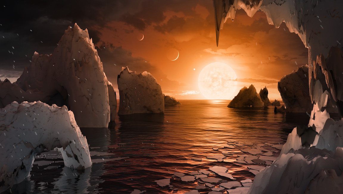 UNSPECIFIED:  In this NASA digital illustration handout released on February 22, 2017, an artist's concept allows us to imagine what it would be like to stand on the surface of the exoplanet TRAPPIST-1f, located in the TRAPPIST-1 system in the constellation Aquarius. Because this planet is thought to be tidally locked to its star, meaning the same face of the planet is always pointed at the star, there would be a region called the terminator that perpetually divides day and night. If the night side is icy, the day side might give way to liquid water in the area where sufficient starlight hits the surface. One of the unusual features of TRAPPIST-1 planets is how close they are to each other -- so close that other planets could be visible in the sky from the surface of each one. In this view, the planets in the sky correspond to TRAPPIST1e (top left crescent), d (middle crescent) and c (bright dot to the lower right of the crescents). TRAPPIST-1e would appear about the same size as the moon and TRAPPIST1-c is on the far side of the star. The star itself, an ultra-cool dwarf, would appear about three times larger than our own sun does in Earth's skies.
The system has been revealed through observations from NASA's Spitzer Space Telescope as well as other ground-based observatories, and the ground-based TRAPPIST telescope for which it was named after. (Photo digital Illustration by NASA/NASA via Getty Images)