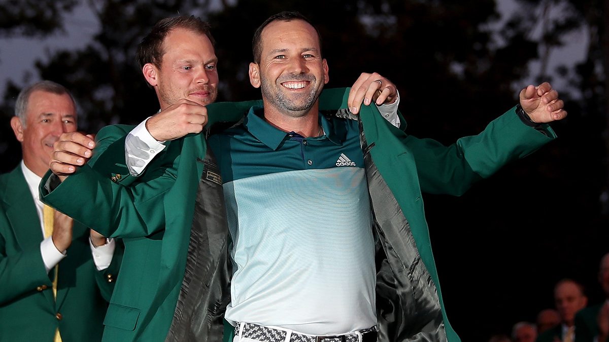 Danny Willett of England presents Sergio Garcia of Spain with the green jacket after Garcia won in a playoff during the final round of the 2017 Masters Tournament at Augusta National Golf Club on April 9, 2017 in Augusta, Georgia. (David Cannon/Getty Images)