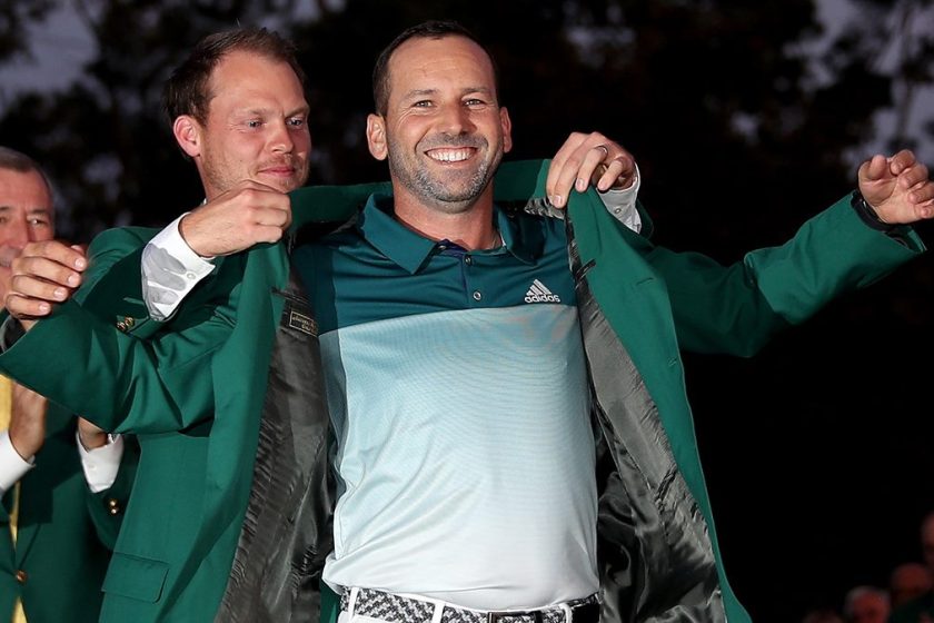 Danny Willett of England presents Sergio Garcia of Spain with the green jacket after Garcia won in a playoff during the final round of the 2017 Masters Tournament at Augusta National Golf Club on April 9, 2017 in Augusta, Georgia. (David Cannon/Getty Images)