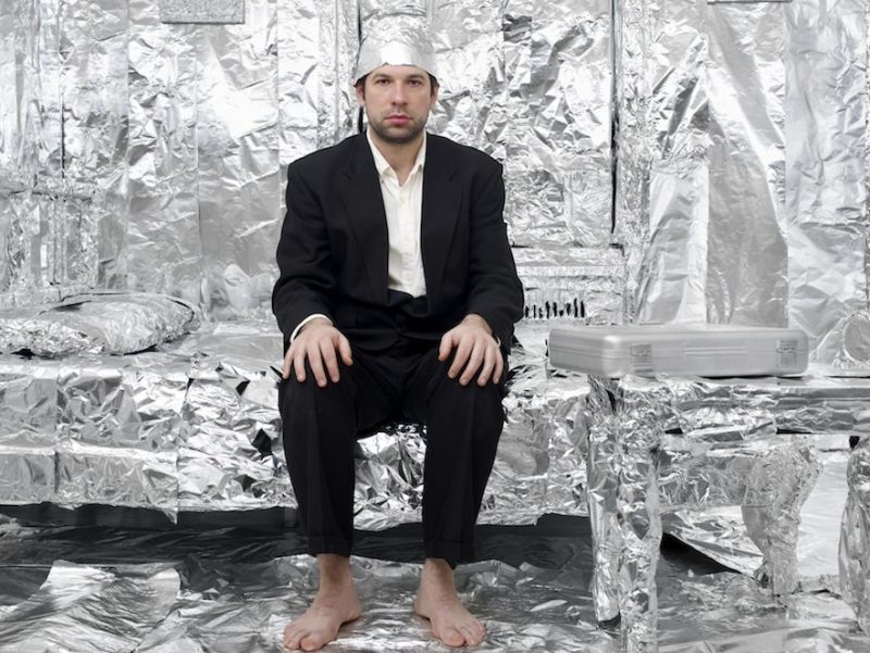 Man in Tin foil lined bed room