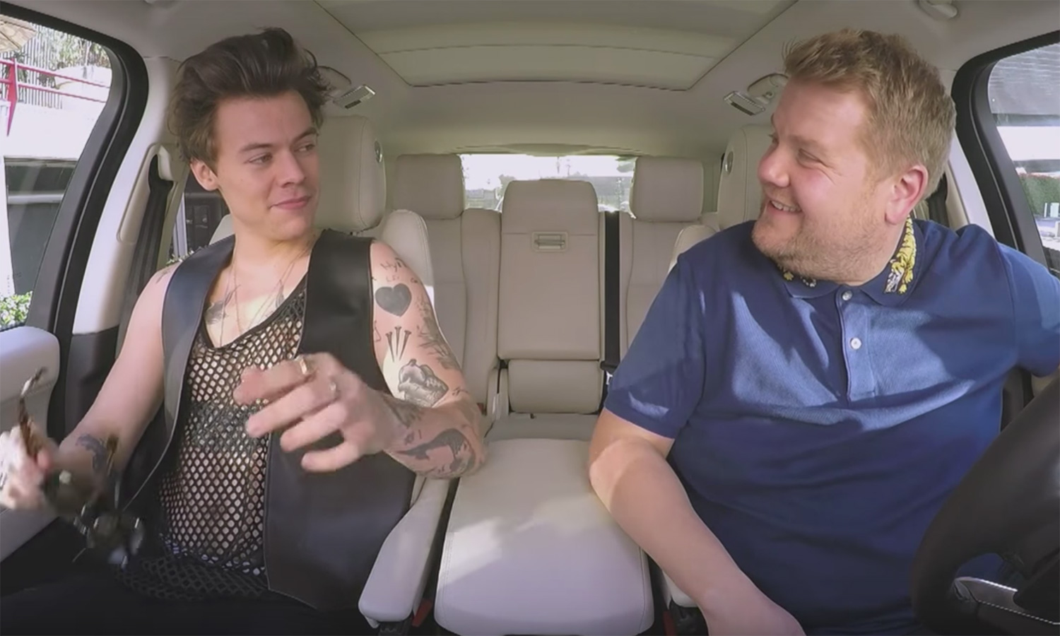 Harry Styles filming a "Carpool Karaoke" segment on "The Late Late Show" with James Corden.