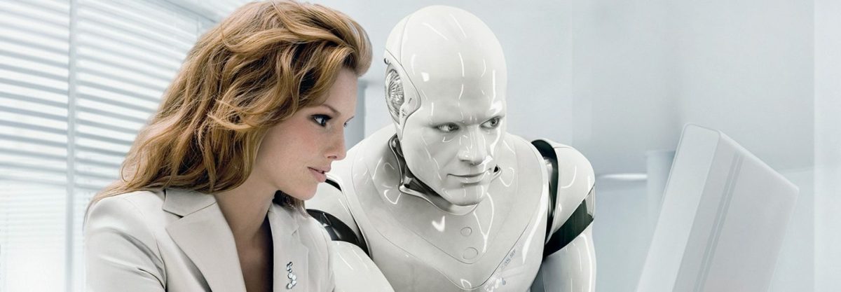 A robot and a businesswoman work side by side.