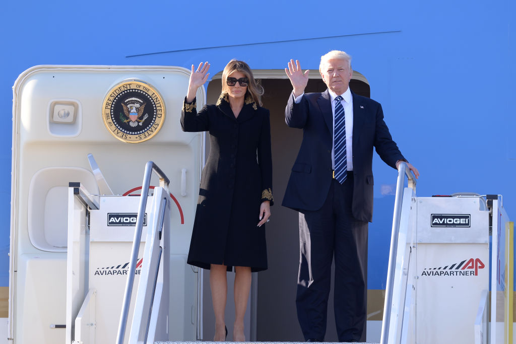 US President Donald Trump and First Lady Melania Trump step off Air Force One upon arrival at Rome's Fiumicino Airport on May 23, 2017. Donald Trump arrived in Rome for a high-profile meeting with Pope Francis in what was his first official trip to Europe since becoming US President.