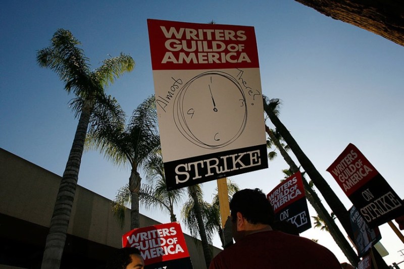 picket sign addresses the question of whether the strike may end soon while Writers Guild of America members and supporters picket in front of NBC studios as hope grows that a draft copy of a proposed deal with Hollywood studios being completed today could lead to an end to the three-month old Hollywood writers strike within days, on February 8, 2008 in Burbank, California. 