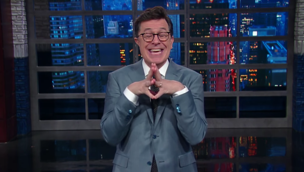 Stephen Colbert gleefully reacts to President Trump calling him a "filthy" and "no-talent guy."