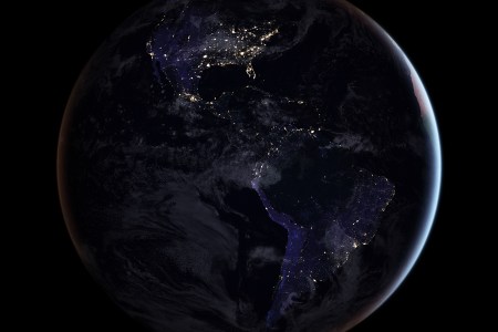 This composite image provides a full-hemisphere view of Earth at night, showing North and South America. (NASA Earth Observatory images by Joshua Stevens, using Suomi NPP VIIRS data from Miguel Román, NASA's Goddard Space Flight Center)