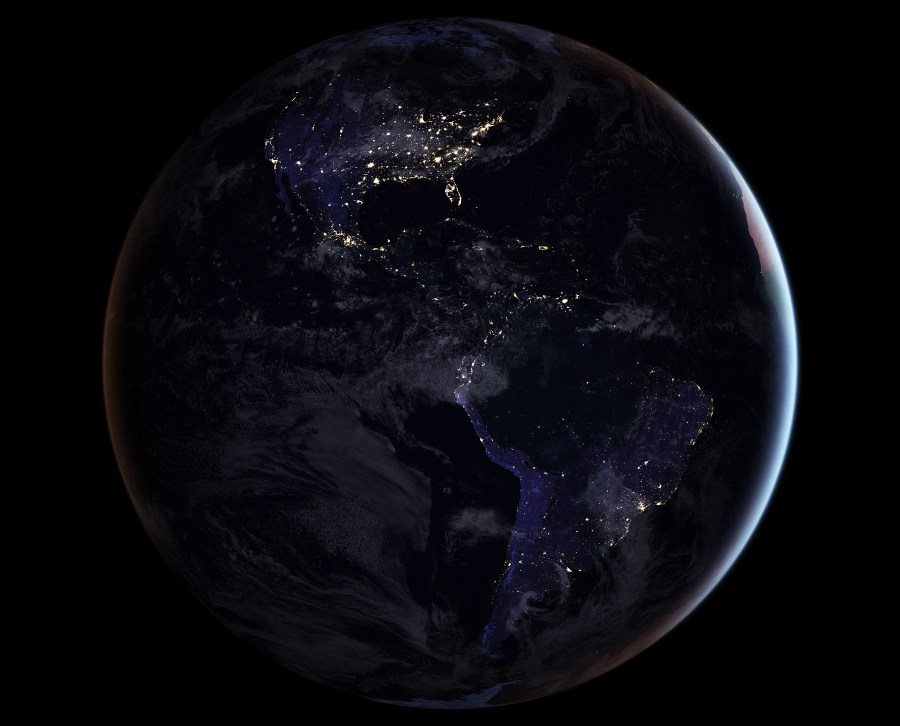 This composite image provides a full-hemisphere view of Earth at night, showing North and South America. (NASA Earth Observatory images by Joshua Stevens, using Suomi NPP VIIRS data from Miguel Román, NASA's Goddard Space Flight Center)