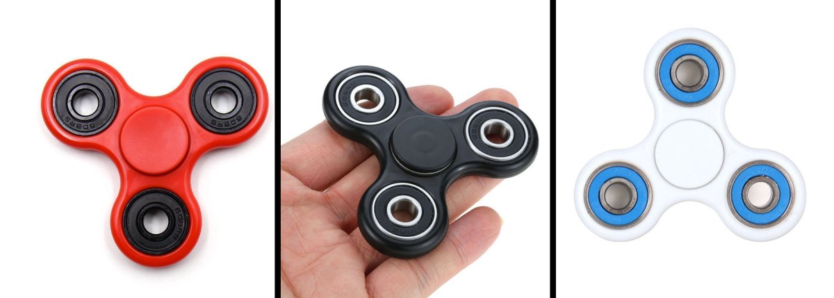 A red, black, and white fidget spinner.