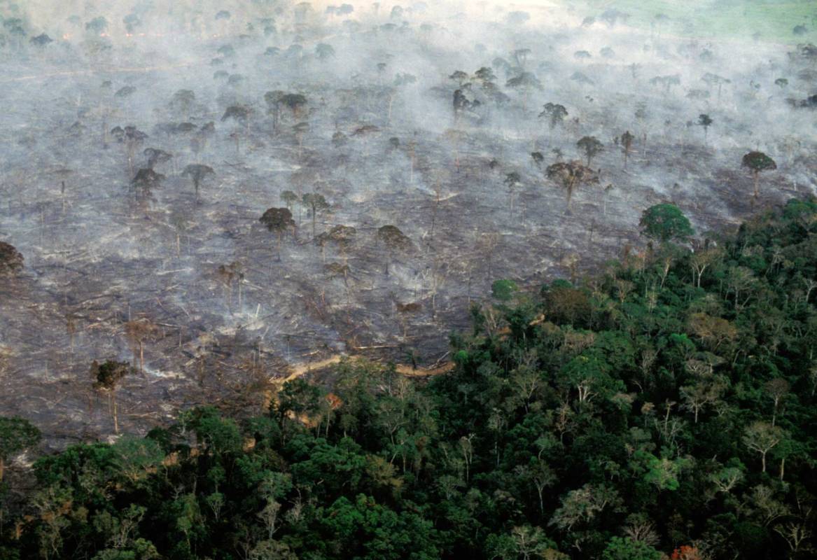 Aerial view of Amazon rainforest in Acre, Brazil burning, farm management with deforestation in 2014. (Ricardo Funari/Brazil Photos/LightRocket via Getty Images)