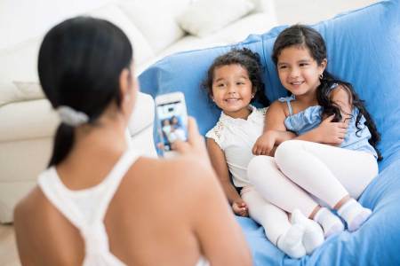 Kids have strong opinions about what their parents share. (Getty Images)