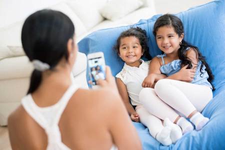 Kids have strong opinions about what their parents share. (Getty Images)