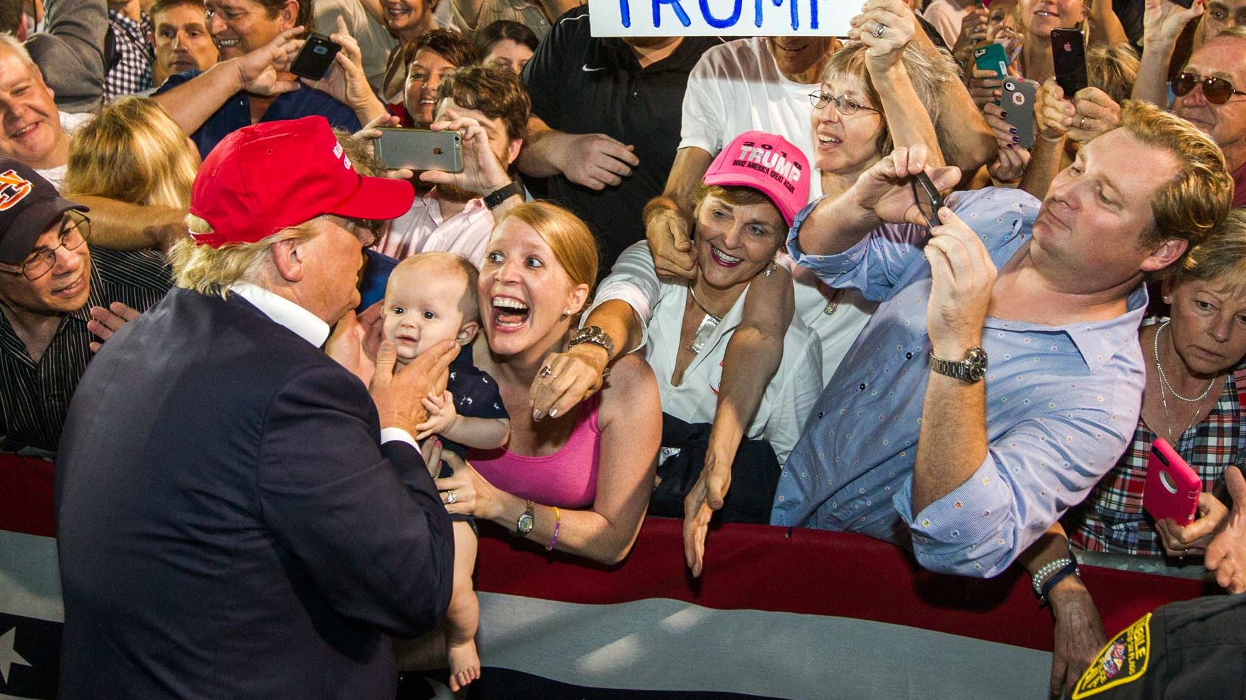 Donald Trump greets supporters after his rally at Ladd-Peebles Stadium on August 21, 2015 in Mobile, Alabama. The Trump campaign used information unwittingly gleaned from social media to find vulnerable voters needed to win. (by Mark Wallheiser/Getty Images)