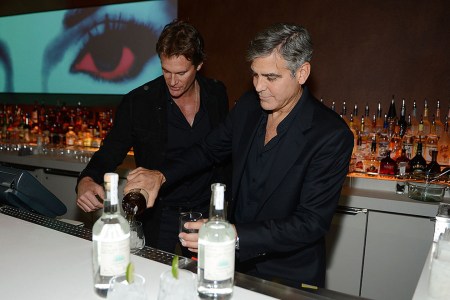 Casamigos Tequila founders Rande Gerber and George Clooney celebrate the launch of Casamigos at Andrea's at Encore Las Vegas on January 9, 2013 in Las Vegas, Nevada.