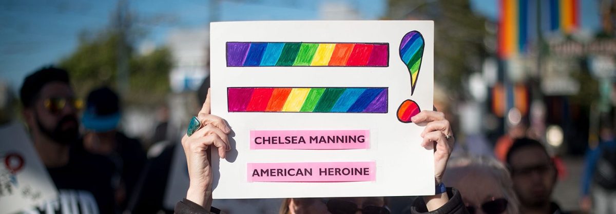 Holly Severson holds up a sign showing support for Chelsea Manning in the Castro District of San Francisco, California on May 17, 2017, during a celebration for Manning's release.