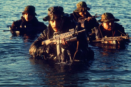 A Navy SEAL with an M16A1 and M203 grenade launcher (US Navy)
