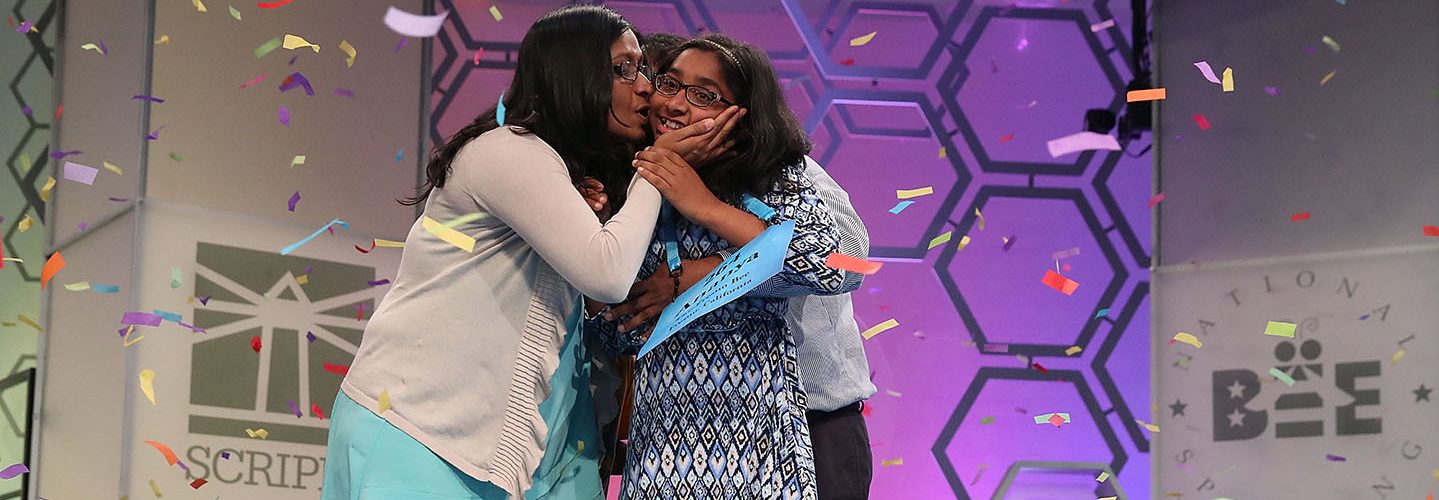 Ananya Vinay of Fresno, CA. gets a kiss from her mom, Anu Pama Poliyedathpp, after winning the 2017 Scripps National Spelling Bee.