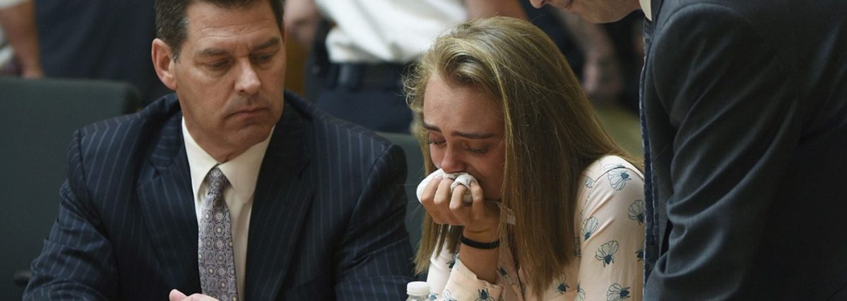 Michelle Carter cries while flanked by defense attorneys Joseph Cataldo, left, and Cory Madera, after being found guilty of involuntary manslaughter in the suicide of Conrad Roy III, Friday, June 16, 2017, in Bristol Juvenile Court in Taunton, Mass.