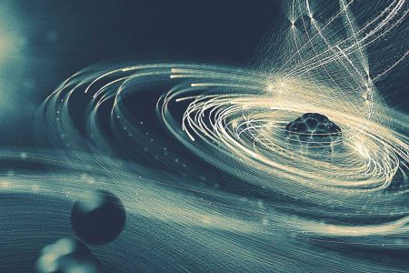 In this illustration, an ultra-intense X-ray laser pulse from SLAC’s Linac Coherent Light Source knocks so many electrons out of a molecule’s iodine atom (right) that the iodine starts pulling in electrons from the rest of the molecule (lower left), like an electromagnetic version of a black hole. Many of the stolen electrons are also knocked out by the laser pulse; then the molecule explodes.