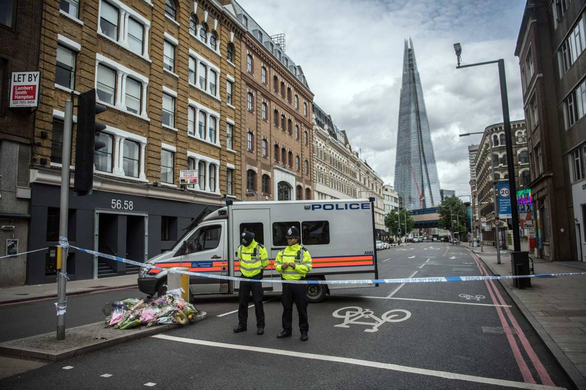 olice officers guard a road near Borough Market on June 6, 2017 in London, England. The third attacker has been named following the attack on Saturday night in London Bridge and Borough in which seven people were killed and forty eight injured. (Carl Court/Getty Images)