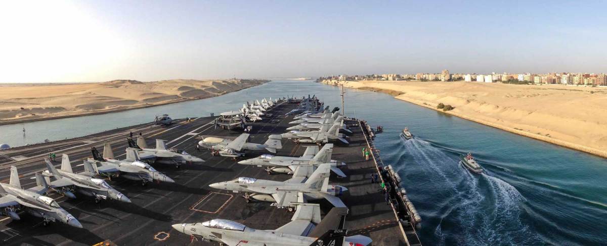 The aircraft carrier USS Dwight D. Eisenhower (CVN 69) transits the Suez Canal. (Mass Communication Specialist Seaman Apprentice Kameren Guy Hodnett/Released)