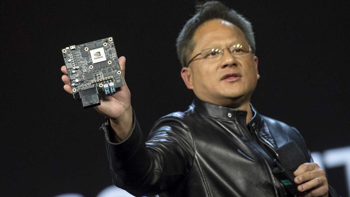 en-Hsun Huang, president and chief executive officer of Nvidia Corp., holds the Nvidia Xavier high-end computing module as he speaks during a keynote presentation at the 2017 Consumer Electronics Show (CES) in Las Vegas, Nevada, U.S., on Wednesday, Jan. 4, 2017. Nvidia, the biggest maker of graphics chips, announced a new version of its Shield set-top box and the debut of an online service designed to bring millions of new consumers to high-end computer games. (David Paul Morris/Bloomberg via Getty Images)