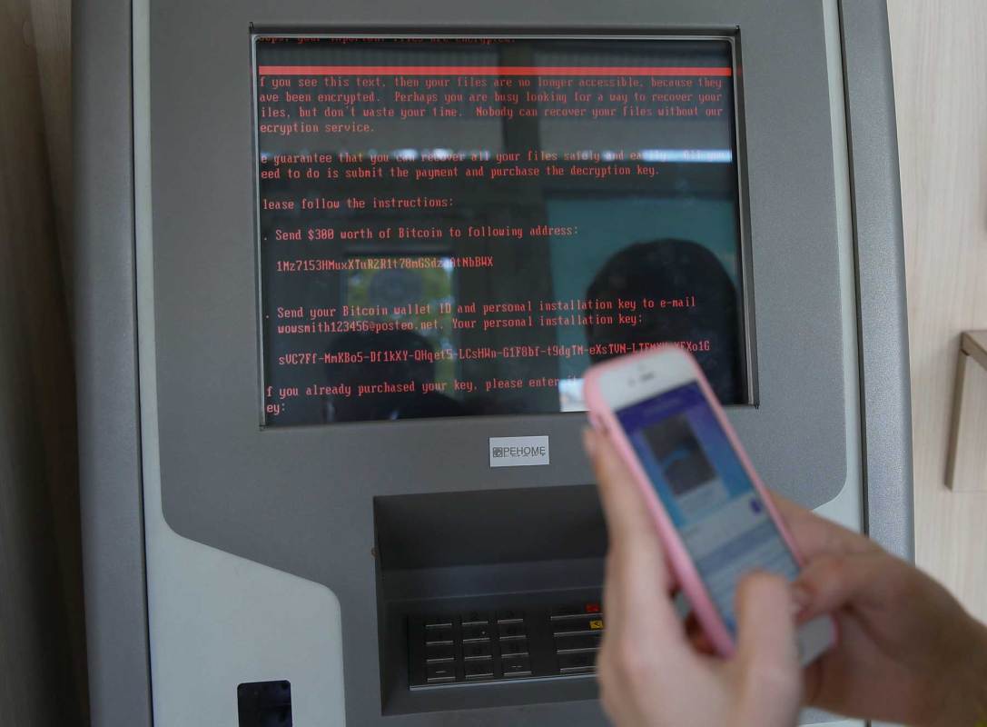 A message demanding money is seen on a monitor of a payment terminal at a branch of Ukraine's state-owned bank Oschadbank after Ukrainian institutions were hit by a wave of cyber attacks earlier in the day, in Kiev, Ukraine, June 27, 2017. (REUTERS/Valentyn Ogirenko )