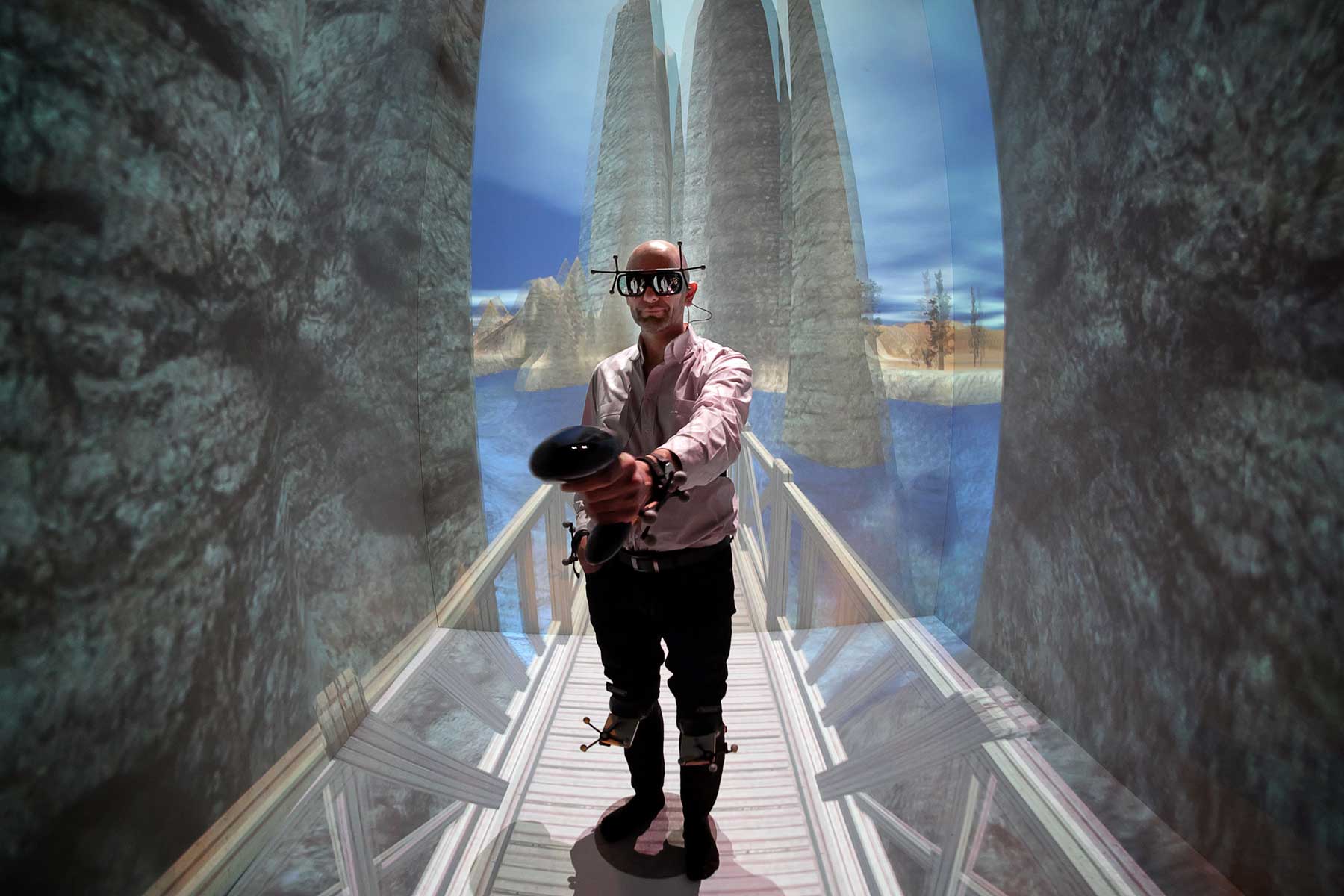 French patient Denis Duet wearing a virtual reality (VR) headset undergoes a VR therapy session called "CtrlStress" at the laboratory of the Institut des Sciences du Mouvement (The Institute of Movement Sciences) in Marseille on January 26, 2016.
Since 2012, Doctor Eric Malbos has been using virtual reality sessions at the institute as a form of treatment for patients suffering from phobias like claustrophobia and acrophobia. (Boris Horvat/AFP/Getty Images)