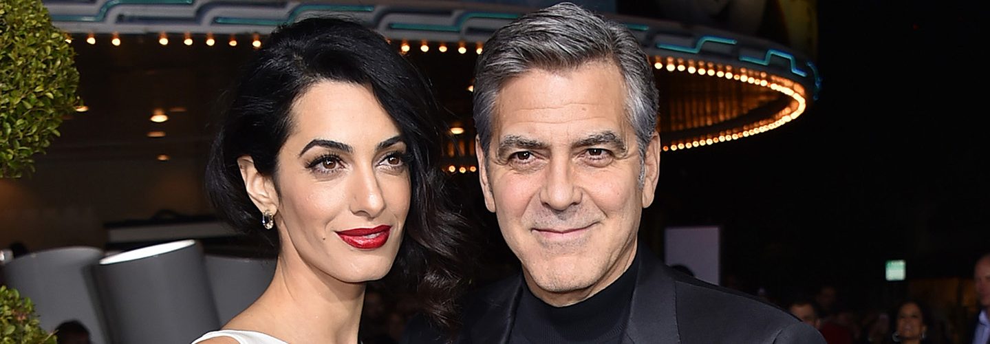 Amal Clooney, left, and George Clooney arrive at the world premiere of "Hail, Caesar!" in Los Angeles. The two wed on Sept. 27, 2014, in Venice, Italy. (Photo by Jordan Strauss/Invision/AP, File)