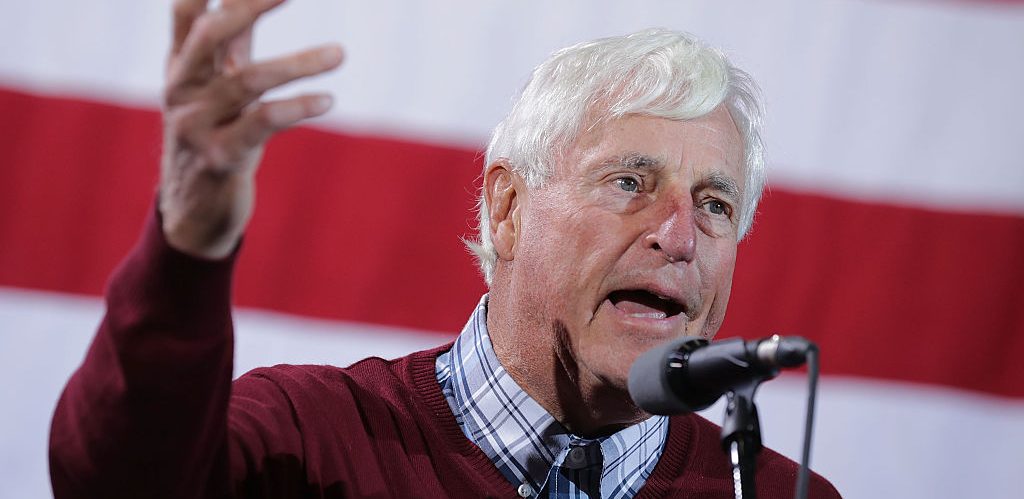 Former Indiana University basketball coach Bobby Knight introduces Republican presidential nominee Donald Trump during a campaign rally at the Deltaplex Arena October 31, 2016 in Grand Rapids, Michigan. With just eight days until the election, polls show a slight tightening in the race. (Photo by Chip Somodevilla/Getty Images)