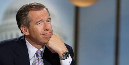 Moderator Brian Williams watches a video which pays tribute to late moderator Tim Russert during a taping of "Meet the Press" at the NBC studios June 22, 2008 in Washington, DC. Williams announced that former Nightly News anchor Tom Brokaw would temporarily host the show through the presidential elections in November, 2008.  (Photo by Alex Wong/Getty Images for Meet the Press)