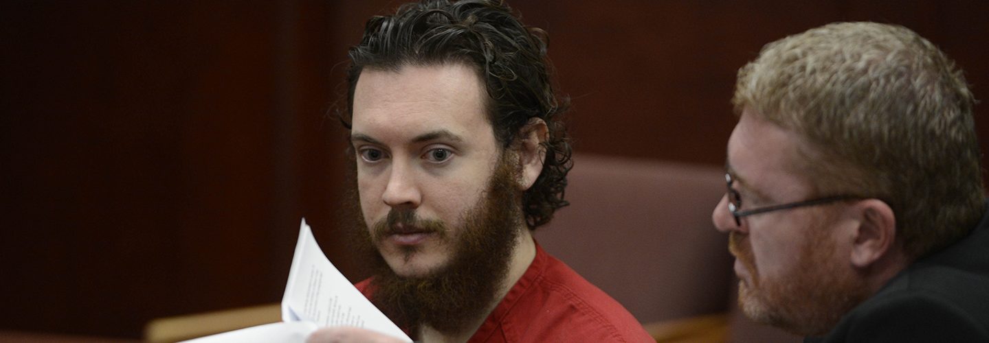 James Holmes looks over advisement papers along with his attorney, Daniel King, during a hearing Tuesday morning June 04, 2013 at the Arapahoe County Justice Center. Holmes is accused of killing 12 people and injuring 70 others in a shooting rampage at an Aurora theater, July 20th, 2012. The court accepted James Holmes plea of not guilty by reason of insanity and has ordered a sanity evaluation at the Colorado Mental Health Institute of Pueblo.