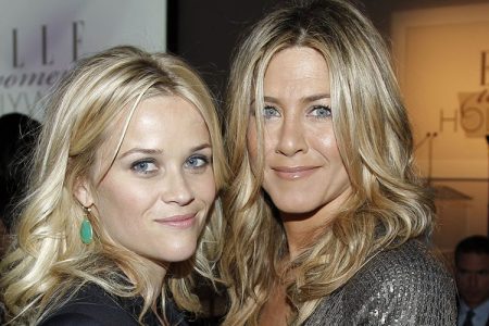 Actresses Jennifer Aniston, left, and Reese Witherspoon pose together at the 18th Annual ELLE Women in Hollywood celebration in Beverly Hills, Calif., Monday, Oct. 17, 2011. The dinner celebrates women’s achievements in film. (AP Photo/Matt Sayles)