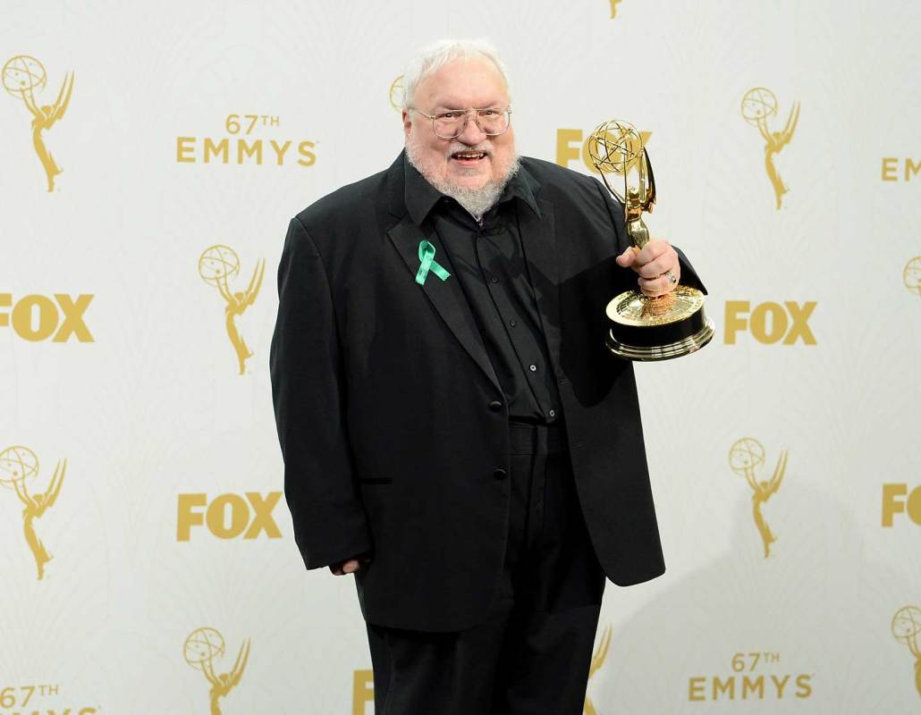 Writer George R. R. Martin, seen here with his Outstanding Drama Series for Emmy 'Game of Thrones' in 2015, could release the next installment in 2018. (Michael Kovac/Getty Images for AXN)