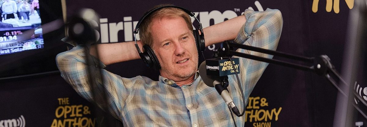 SiriusXM host Gregg Hughes attends 'The Opie & Anthony Show' at SiriusXM Studios on August 13, 2012 in New York City.