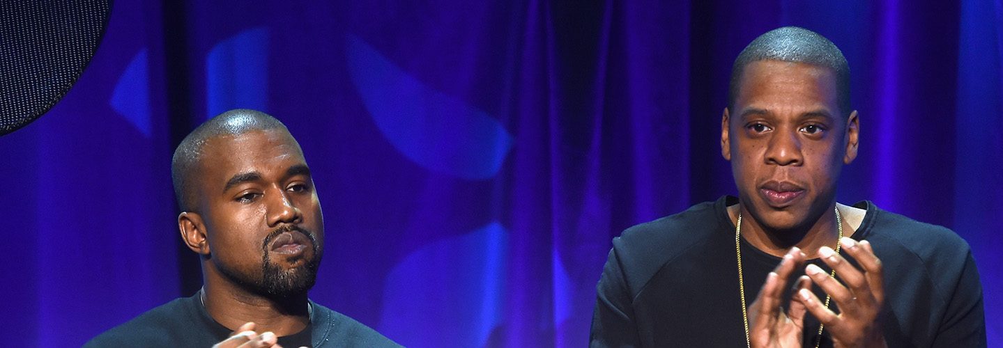 Kanye West (L) and JAY Z onstage at the Tidal launch event #TIDALforALL at Skylight at Moynihan Station on March 30, 2015 in New York City.
