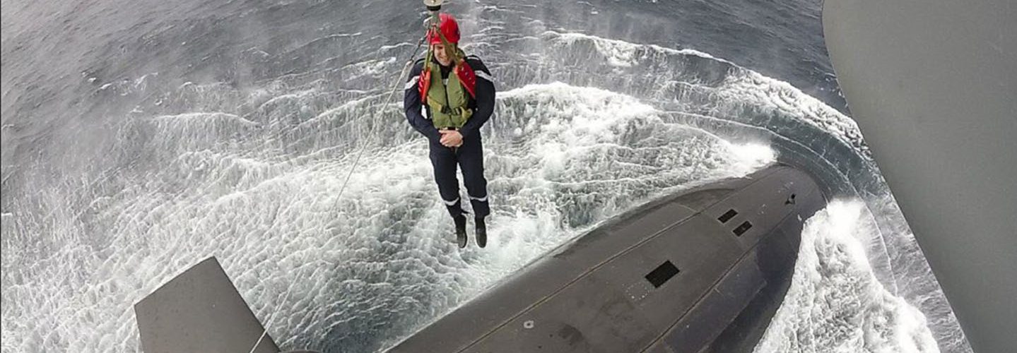 Emmanuel Macron was lowered down from a helicopter on to the submarine in the Atlantic. (@EmmanuelMacron/Twitter)