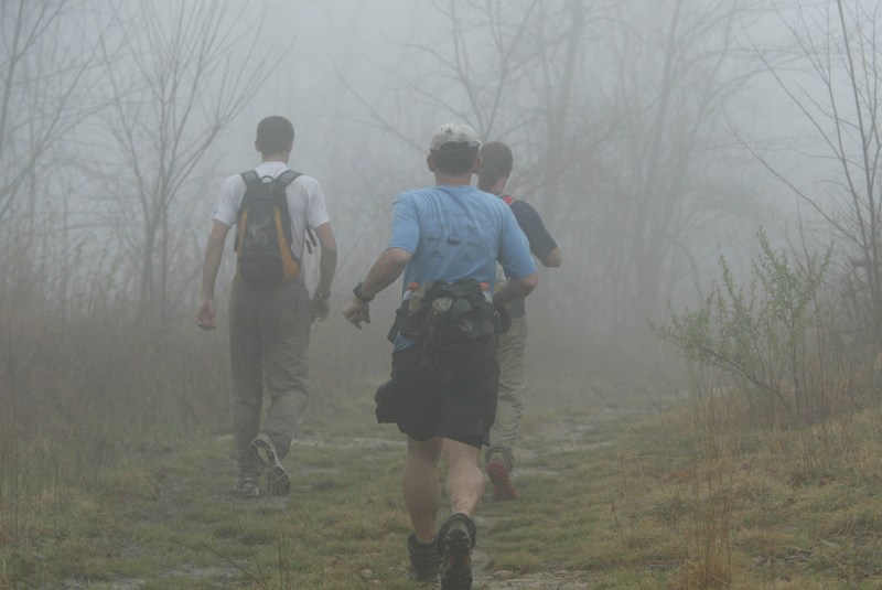 FROZEN HEAD LAKE STATE PARK, VA - APRIL 1: Andras Low, Mike Dobies, and Greg Eason (L to R) make their way through the fog atop one of the mountains in the Barkley Marathon. Photographed April 1, 2007 in Frozen Head Lake State Park, TN. (Photo by Preston Keres/The Washington Post via Getty Images)