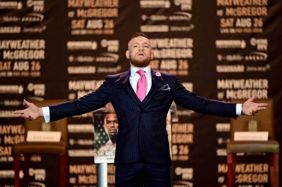 Conor McGregor poses on stage as he is introduced for the Floyd Mayweather Jr. v Conor McGregor World Press Tour at Staples Center on July 11, 2017 in Los Angeles, California.  (Harry How/Getty Images)