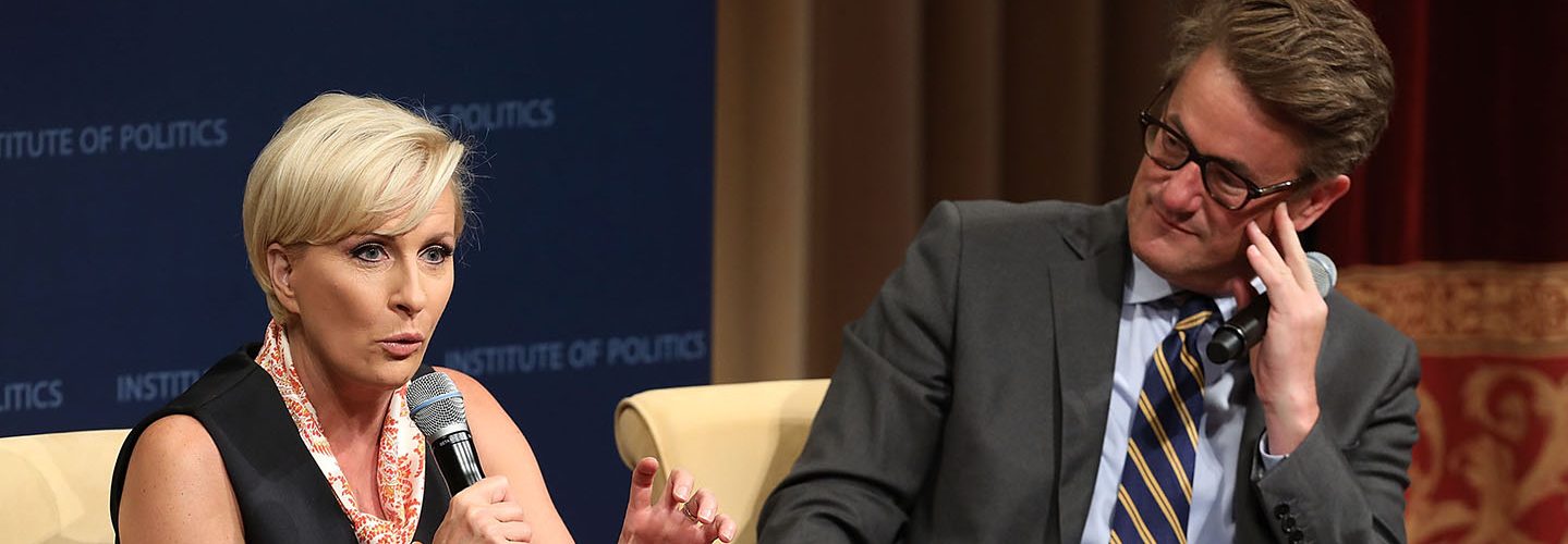 MSNBC 'Morning Joe' hosts Joe Scarborough (R) and Mika Brzezinski are interviewed by philanthropist and financier David Rubenstein during a Harvard Kennedy School Institute of Politics event in the McGowan Theater at the National Archives July 12, 2017 in Washington, DC. Scarborough and Brzezinski, who are engaged to be married, were recently attacked by President Donald Trump on Twitter, where he called the hosts 'Psycho Joe' and 'low I.Q. Crazy Mika,' among other personal insults.