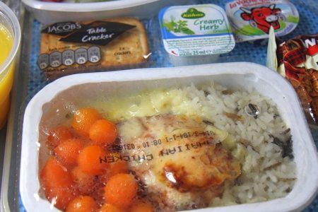 One expert talks to Bloomberg about why you should stop eating food on planes.