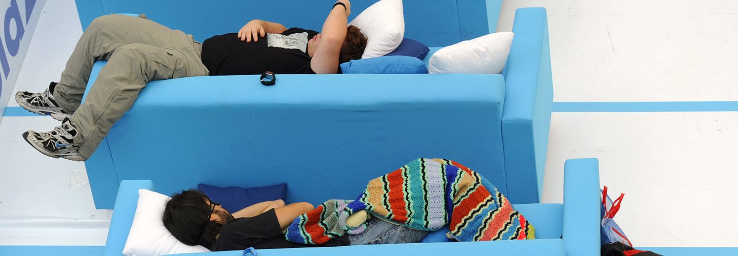 People sleep as they take part in the first Siesta (Nap) Championship on October 21, 2010 in a suburban shopping centre of Madrid.