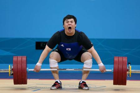 Whaseung Kim of Korea competes in the Men's 105kg Weightlifting on Day 10 of the London 2012 Olympic Games at ExCeL on August 6, 2012 in London, England. (Ezra Shaw/Getty Images)