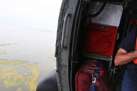 Coast Guard Rear Adm. Paul Zukunft looks out on the oil containment progress in Barataria Bay, Thursday, Aug. 5, 2010 (AP Photo/Kerry Maloney)