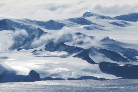 Mountains stand near the coast of West Antarctica as seen from a window of a NASA Operation IceBridge airplane on October 27, 2016 in-flight over Antarctica. (Mario Tama/Getty Images)