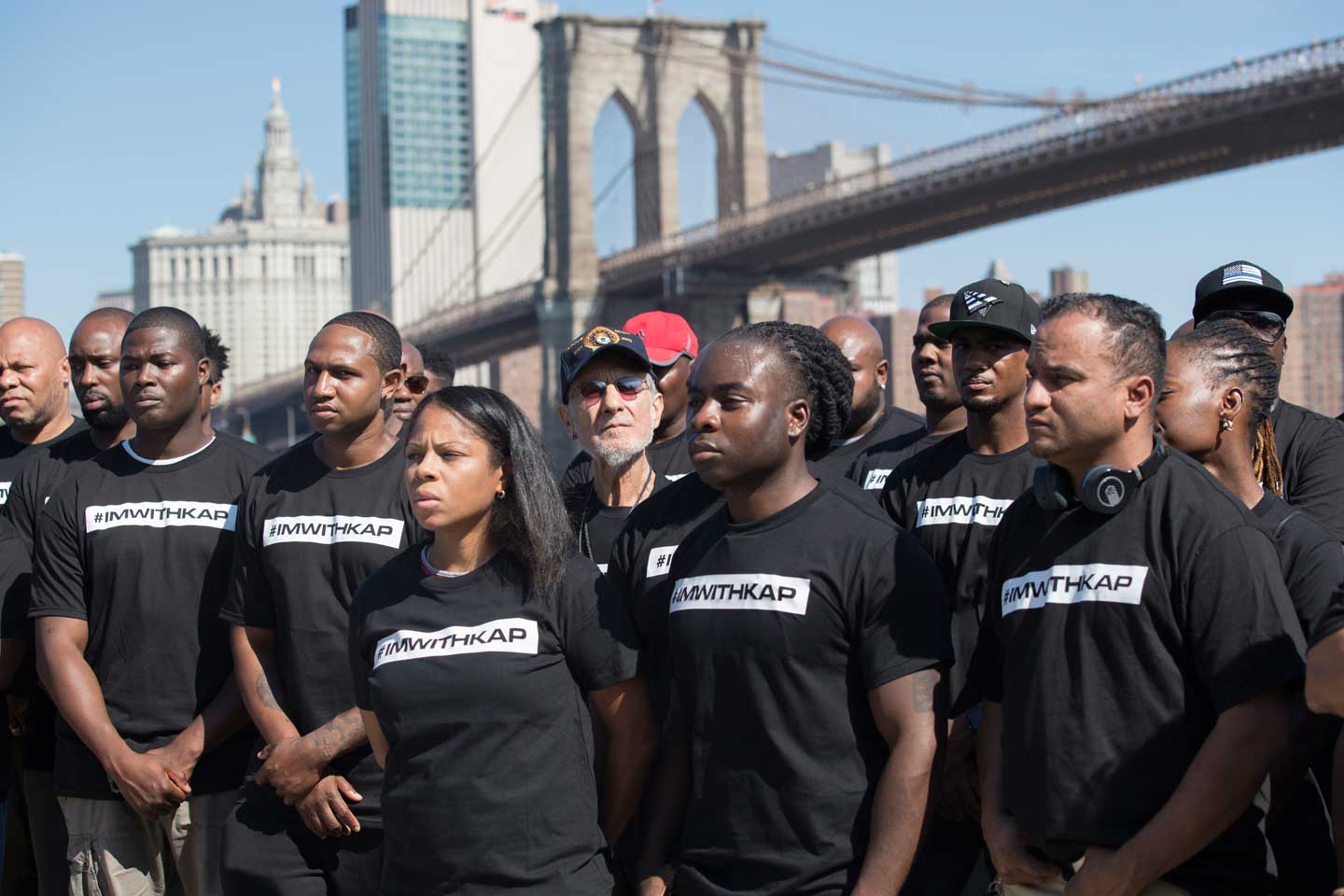 Retired New York City Police Officer Frank Serpico, center, stands with other members of law enforcement during a rally to show support for Colin Kaepernick, Saturday, Aug. 19, 2017, in New York. Kaepernick, the former quarterback for the San Francisco 49ers, became a controversial figure last year after he refused to stand for the national anthem. He said it was a protest against oppression of black people. (AP Photo/Mary Altaffer)